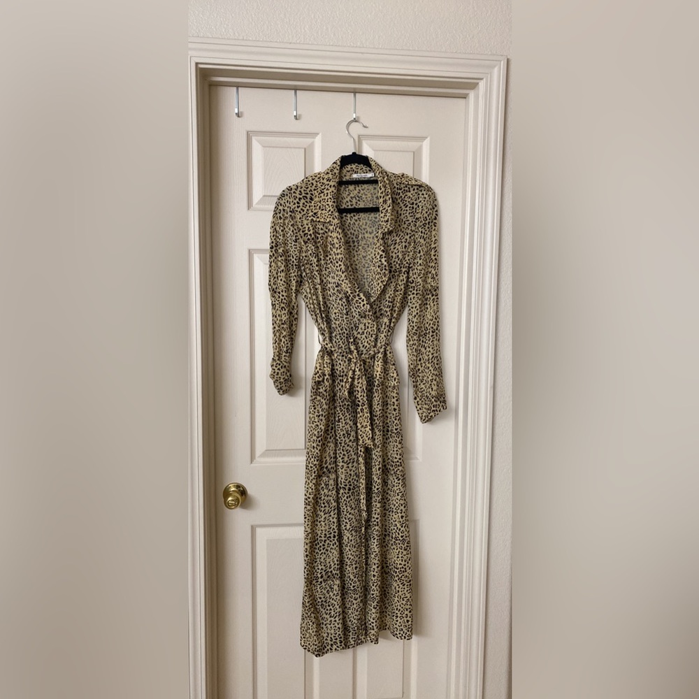 Leopard print silk wrap like dress. Paid $480 worn once, it’s a medium-large.